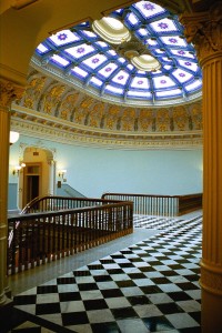 The East Rotunda is complete with eloquent stained glass and marble tiles.  Photo Credit: GSA.gov